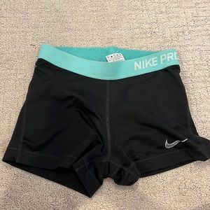 Blue Nike pro shorts